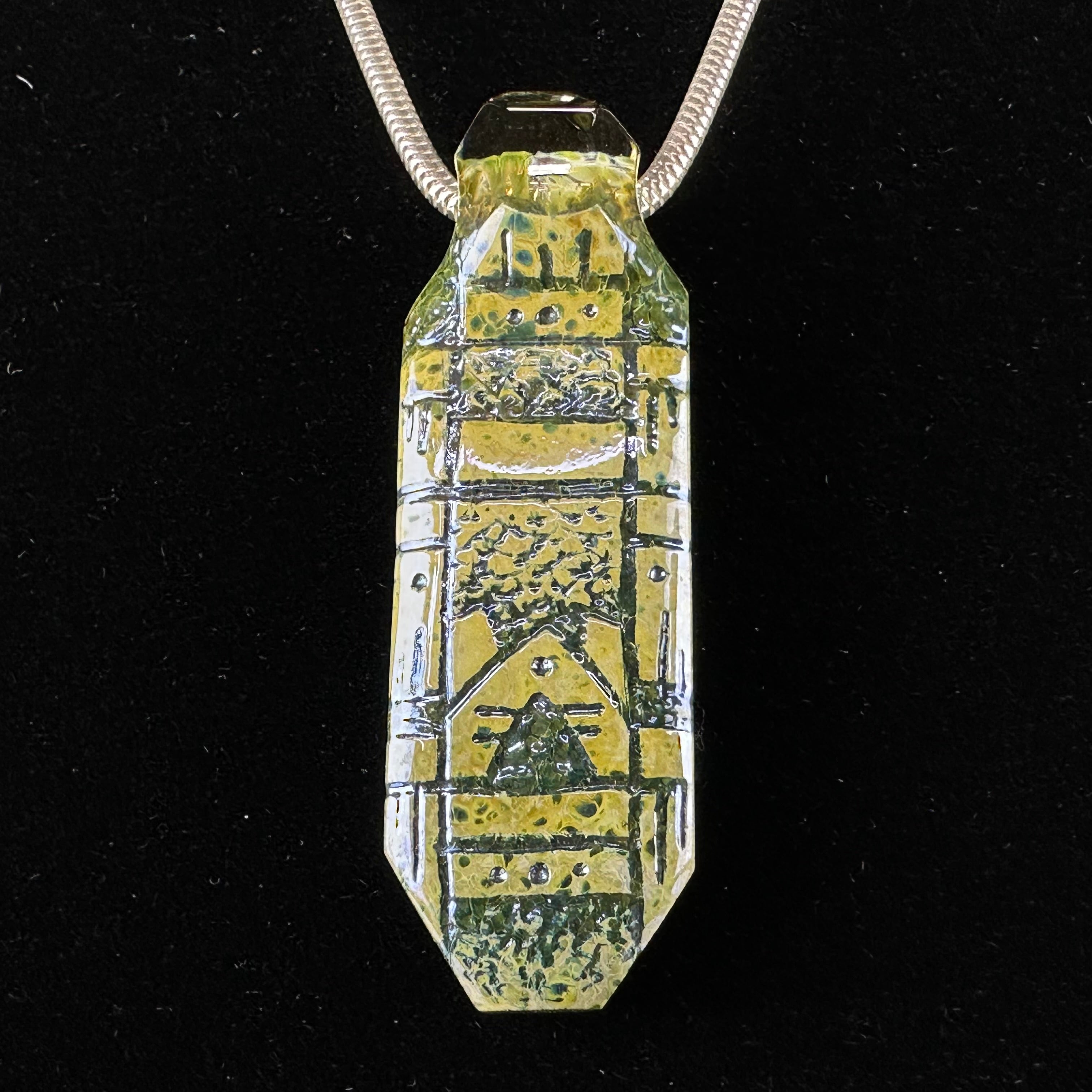 Faceted Hand Carved Pendant by Corey Clark