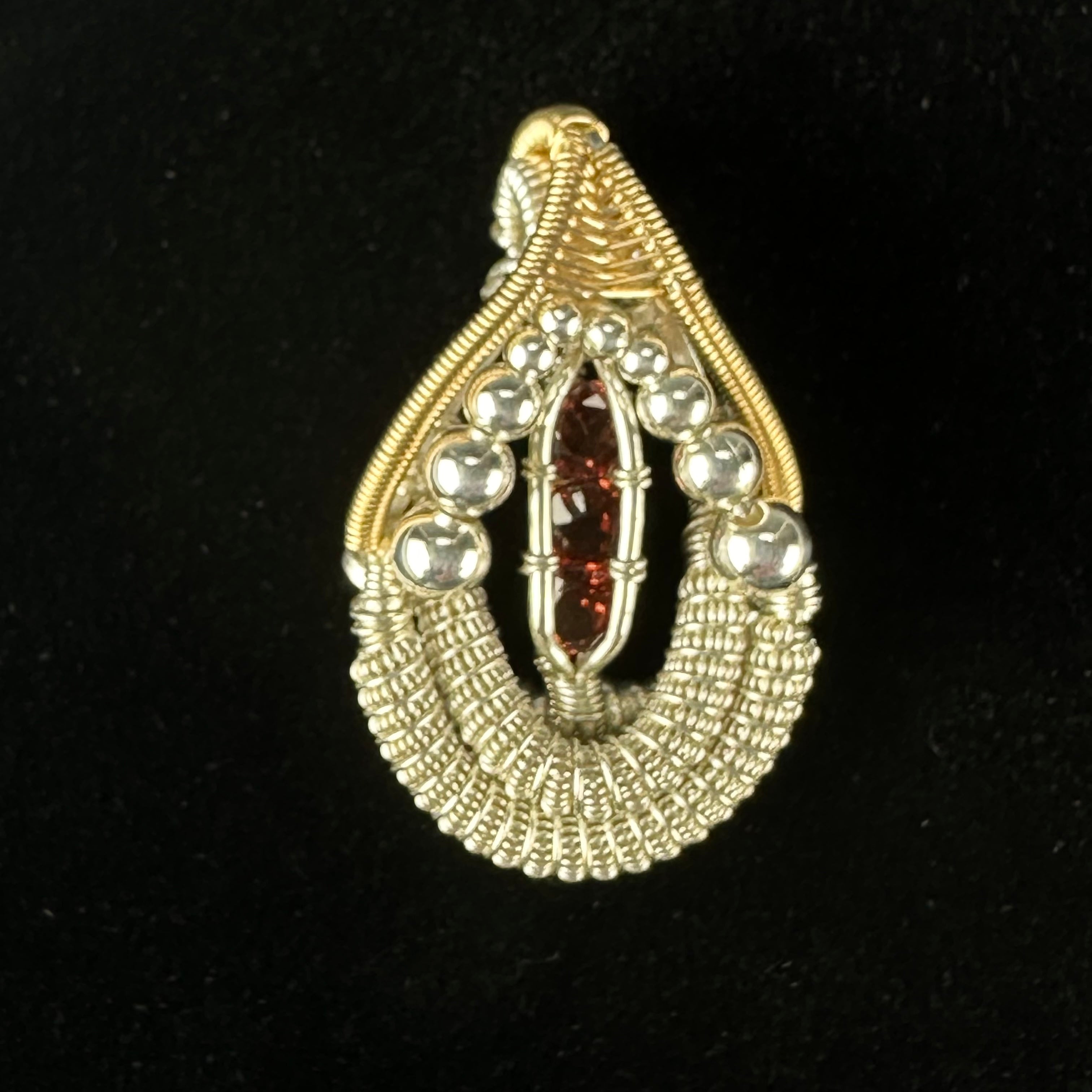 Almendine Garnet Wire Wrapped Pendant by Cosmic Wraps